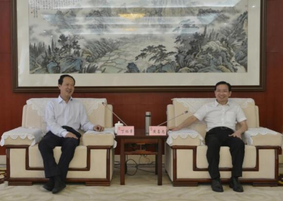 丁焰章拜會南昌市委副書記、市長黃喜忠